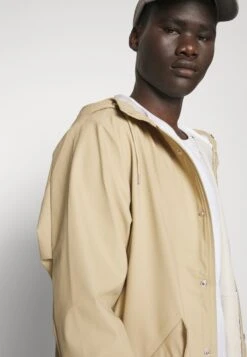 Rains Fishtail Unisex - Veste Imperméable - Sand -Rains 4d55208a5485429eb950142940c6d47f