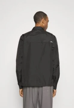 Rains Dili Unisex - Veste Légère - Black -Rains 5001d749300b4959a82d8a3739959991