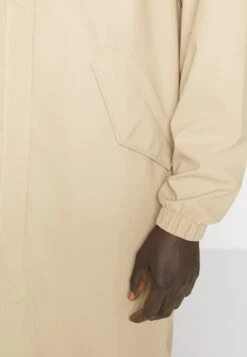 Rains Fishtail Unisex - Veste Imperméable - Sand -Rains 635ef4401d45444b91ebaf87942b6a3d