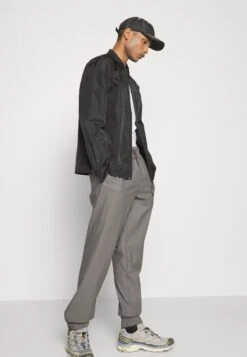 Rains Dili Unisex - Veste Légère - Black -Rains b3de3e13ab54487695c8d20ac0d56e72